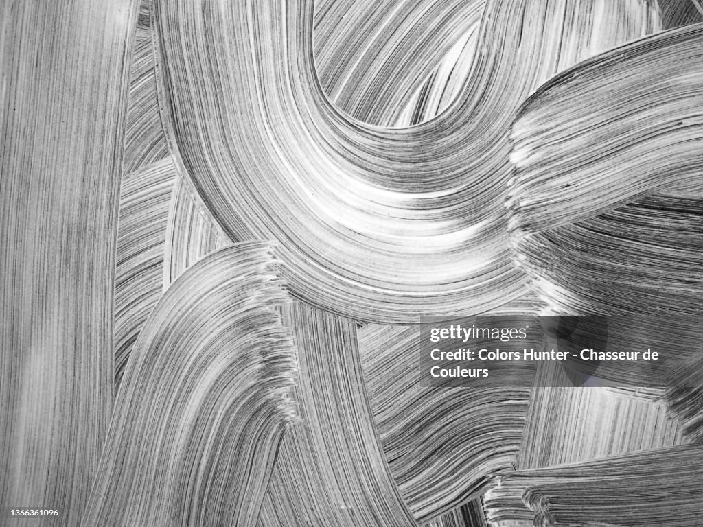 Abstract photography of a window covered by white paint on in Paris