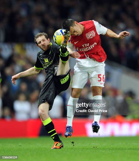 Nico Yennaris of Arsenal challenges Mika Vayrynen of Leeds during the FA Cup Third Round match between Arsenal and Leeds United at Emirates Stadium...