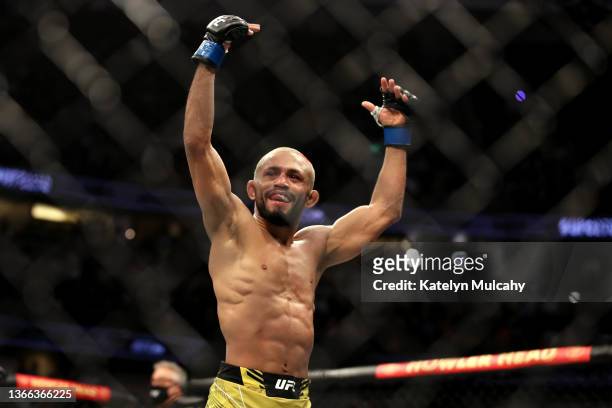Deiveson Figueiredo of Brazil reacts against Brandon Moreno of Mexico in their flyweight title fight during the UFC 270 event at Honda Center on...