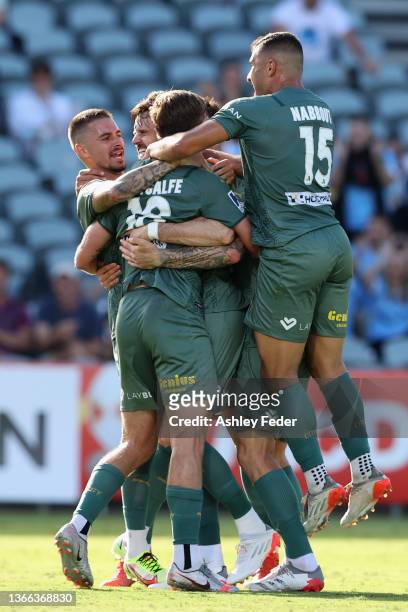 Carl Jenkinson of Melbourne City celebrates his goal wirth team mates during the round 11 A-League match between Central Coast Mariners and Melbourne...