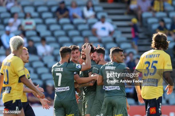 Carl Jenkinson of Melbourne City celebrates his goal wirth team mates during the round 11 A-League match between Central Coast Mariners and Melbourne...