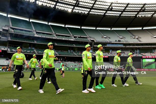 Sydney Thunder players enter the arena during the Men's Big Bash League match between the Sydney Thunder and the Adelaide Strikers at Melbourne...