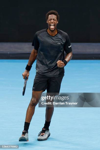 Gael Monfils of France celebrates after winning a point in his fourth round singles match against Miomir Kecmanovic of Serbia during day seven of the...