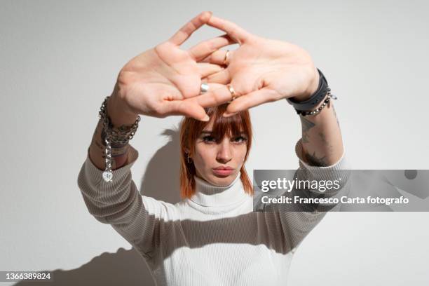 young woman gesturing - disrespect stock-fotos und bilder