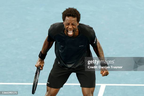 Gael Monfils of France celebrates match point in his fourth round singles match against Miomir Kecmanovic of Serbia during day seven of the 2022...