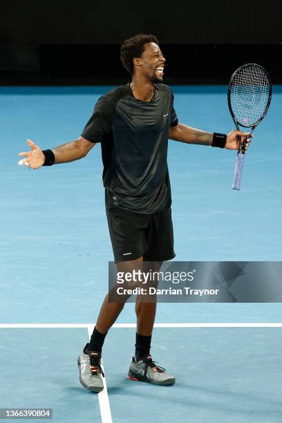 Gael Monfils of France celebrates match point in his fourth round singles match against Miomir Kecmanovic of Serbia during day seven of the 2022...