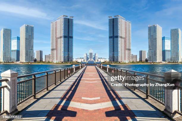 tokyo skyline in toyosu, japan at day time. - toyosu stock pictures, royalty-free photos & images