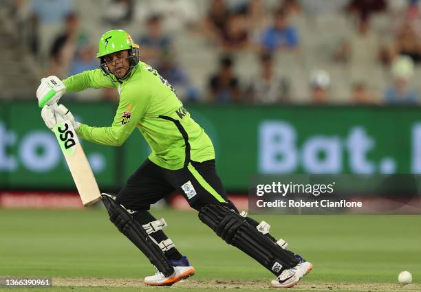 Usman Khawaja of the Thunder bats during the Men's Big Bash League match between the Sydney Thunder and the Adelaide Strikers at Melbourne Cricket...