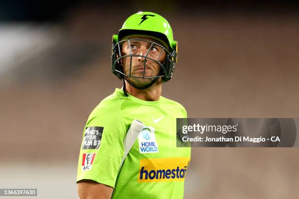 Daniel Sams of the Thunder looks on during the Men's Big Bash League match between the Sydney Thunder and the Adelaide Strikers at Melbourne Cricket...