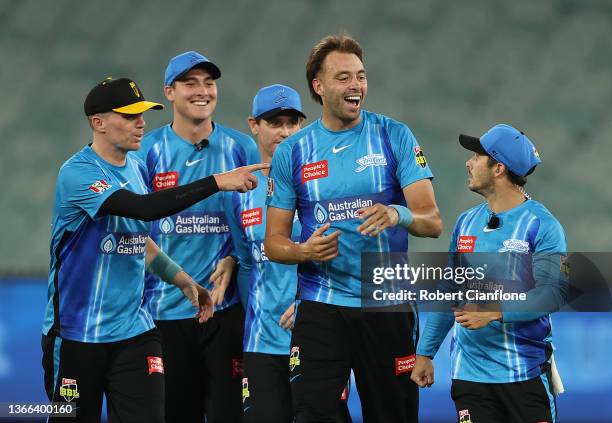 The Strikers celebrate after they defeated the Thunder during the Men's Big Bash League match between the Sydney Thunder and the Adelaide Strikers at...