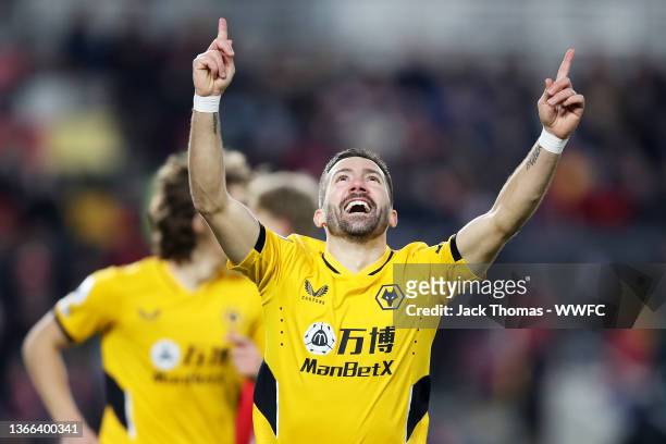 Joao Moutinho of Wolverhampton Wanderers celebrates after scoring his team's first goal during the Premier League match between Brentford and...