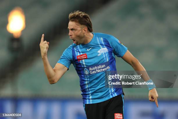 Harry Conway of the Strikers celebrates taking the wicket of Ben Cutting of the Thunder during the Men's Big Bash League match between the Sydney...