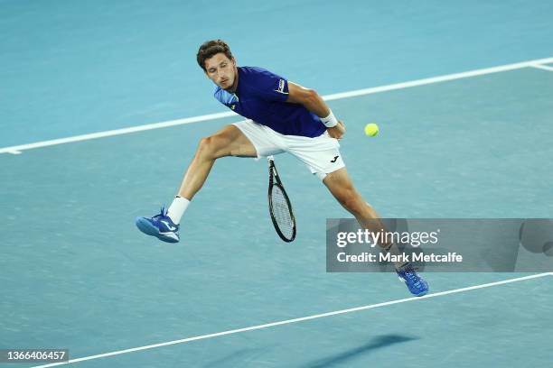 Pablo Carreno Busta of Spain plays a forehand volley between his legs in his fourth round singles match against Matteo Berrettini of Italy during day...