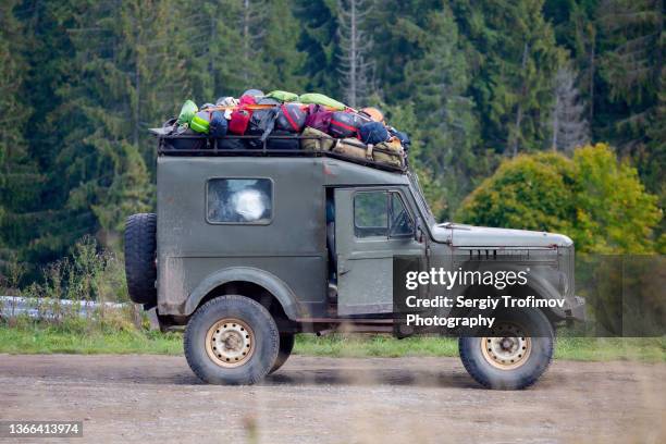 off road car loaded with tourist equipment - empty car boot stock pictures, royalty-free photos & images