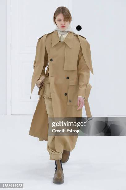 Model walks the runway during the Wooyoungmi Menswear Fall/Winter 2022-2023 show as part of Paris Fashion Week on January 23, 2022 in Paris, France.