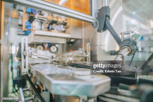 Labelling Factory Photos and Premium High Res Pictures - Getty Images
