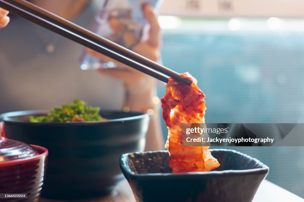 Eating Korean kimchi