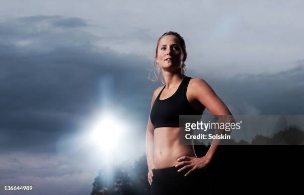 portrait of track and field athlete - three quarter length stock pictures, royalty-free photos & images