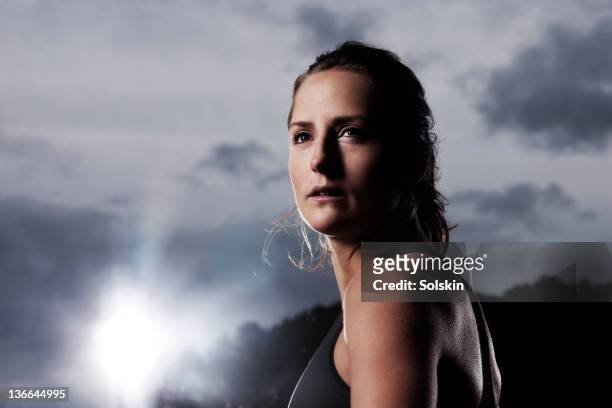 portrait of track and field athlete - forward athlete stock pictures, royalty-free photos & images