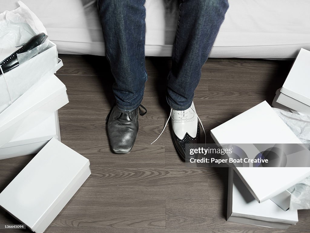 Man trying on a new pair of smart shoes