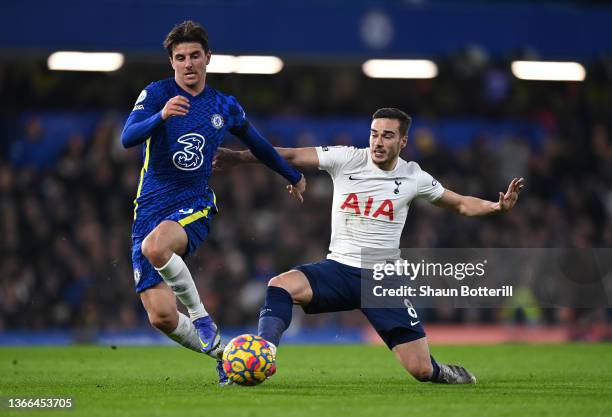 Mason Mount of Chelsea is challenged by Harry Winks of Tottenham Hotspur during the Premier League match between Chelsea and Tottenham Hotspur at...