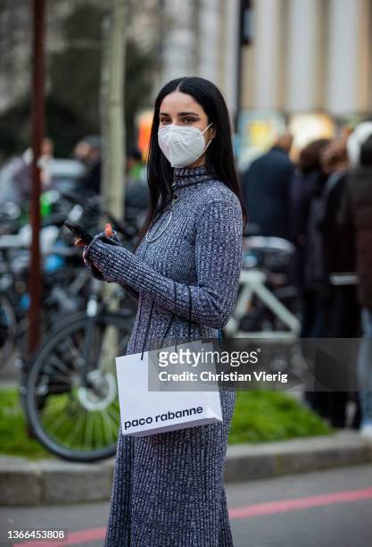 Fiona Zanetti seen wearing grey dress outside Paco Rabanne during Paris Fashion Week - Menswear F/W 2022-2023 on January 23, 2022 in Paris, France.