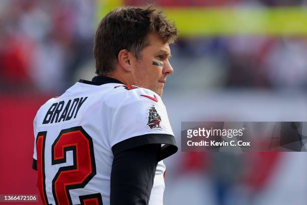Tom Brady of the Tampa Bay Buccaneers looks on before the game against the Los Angeles Rams in the NFC Divisional Playoff game at Raymond James...