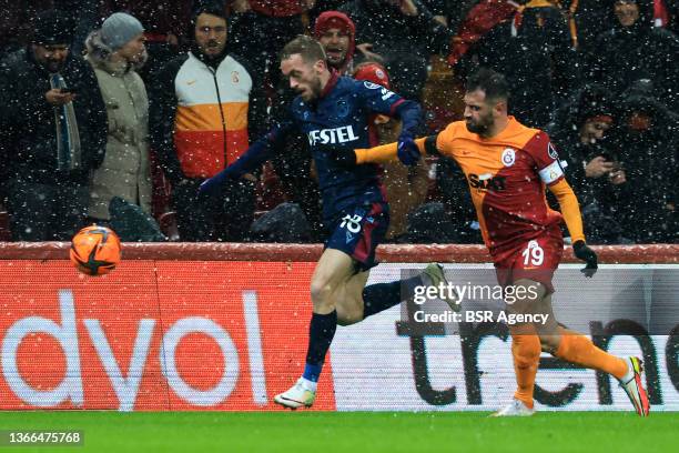 Edin Visca of Trabzonspor and Omer Bayram of Galatasaray during the Turkish Super Lig match between Galatasaray and Trabzonspor at Nef Stadyumu on...