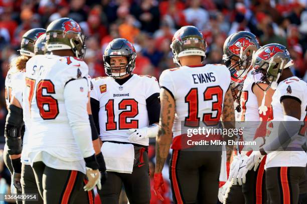 Tampa Bay Buccaneers offensive players huddle in the second quarter of the game against the Los Angeles Rams in the NFC Divisional Playoff game at...