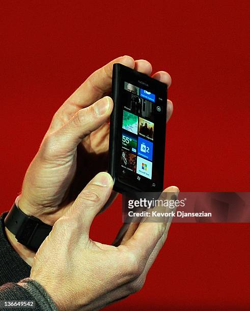 Host Ryan Seacrest show displays the new Nokia Lumia 900 Windows phone as Microsoft CEO Steve Ballmer delivers a keynote address at the 2012...