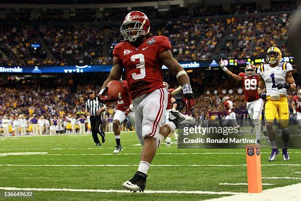 Trent Richardson of the Alabama Crimson Tide celebrates after scoring a touchdown in the fourth quarter against the Louisiana State University Tigers...