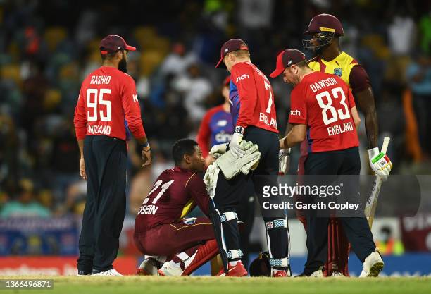 Akeal Hosein of West Indies cuts a dejected figure following the T20 International Series Second T20I match between West Indies and England at...