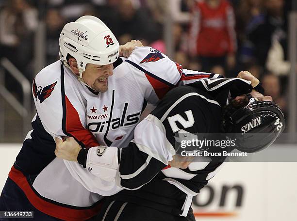 Matt Hendricks of the Washington Capitals and Colin Fraser of the Los Angeles Kings fight during the first period at the Staples Center on January 9,...