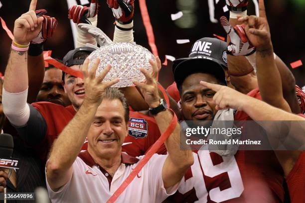 Head coach Nick Saban of the Alabama Crimson Tide celebrates with the trophy after defeating Louisiana State University Tigers in the 2012 Allstate...