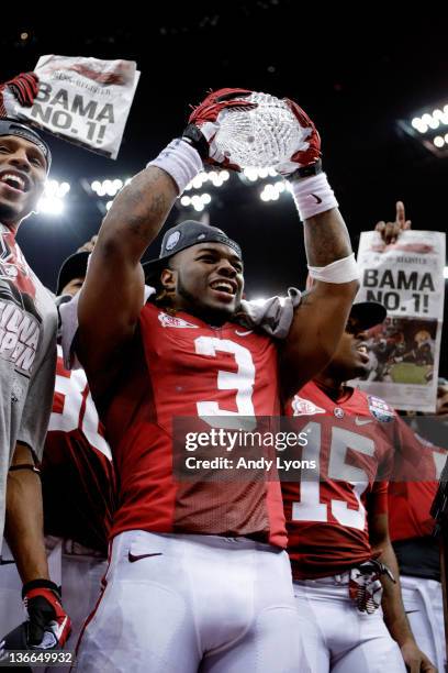 Trent Richardson of the Alabama Crimson Tide celebrates with the trophy after defeating Louisiana State University Tigers in the 2012 Allstate BCS...