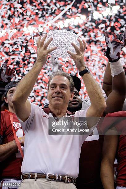 Head coach Nick Saban of the Alabama Crimson Tide celebrates with the trophy after defeating Louisiana State University Tigers in the 2012 Allstate...