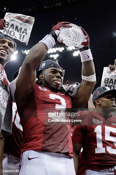 Trent Richardson of the Alabama Crimson Tide celebrates with the trophy after defeating Louisiana State University Tigers in the 2012 Allstate BCS...
