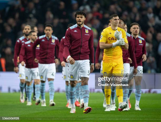 Captain Tyrone Mings leads out the Aston Villa team during the Premier League match between Aston Villa and Manchester United at Villa Park on...