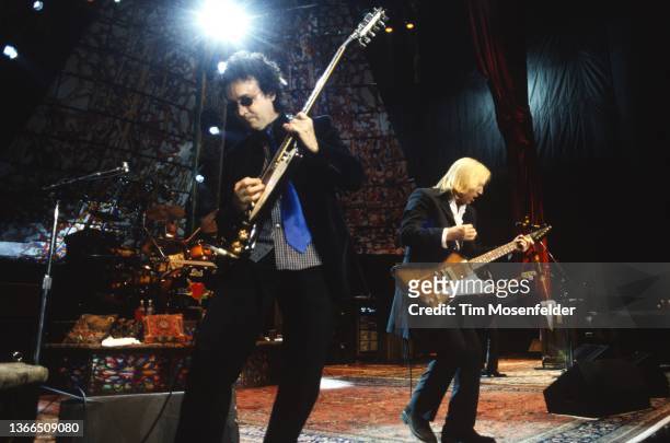 Mike Campbell and Tom Petty of Tom Petty and the Hearbreakers perform at Shoreline Amphitheatre on August 27, 1999 in Mountain View, California.