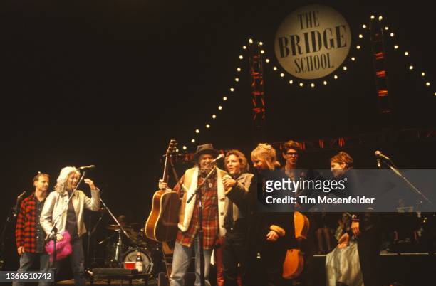 Emmylou Harris, Neil Young, Pegi Young, Eddie Vedder, and Sheryl Crow perform during the finale at Neil Young's Annual Bridge School benefit at...