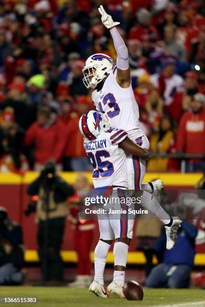 Gabriel Davis of the Buffalo Bills celebrates with his teammate Devin Singletary after scoring a 19 yard touchdown against the Kansas City Chiefs...