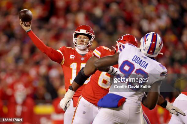 Patrick Mahomes of the Kansas City Chiefs throws the game winning touchdown to Travis Kelce against the Buffalo Bills during overtime of the AFC...