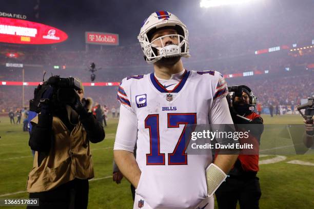 Josh Allen of the Buffalo Bills walks off the field after being defeated by the Kansas City Chiefs in the AFC Divisional Playoff game at Arrowhead...