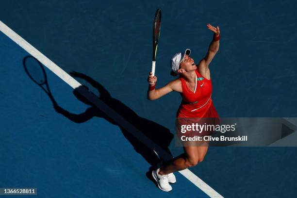 Simona Halep of Romania serves during her fourth round singles match against Alize Cornet of France during day eight of the 2022 Australian Open at...