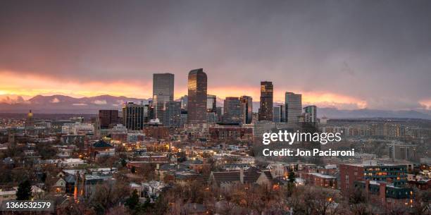 denver skyline and the rocky mountains - denver art stock pictures, royalty-free photos & images