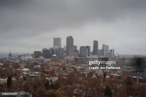 denver skyline and the rocky mountains - denver winter stock pictures, royalty-free photos & images