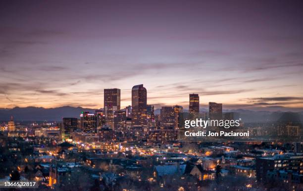 denver skyline and the rocky mountains - denver stock pictures, royalty-free photos & images