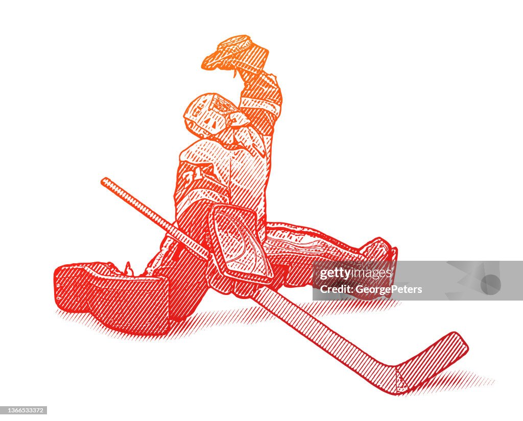 Ice Hockey goalie making a save