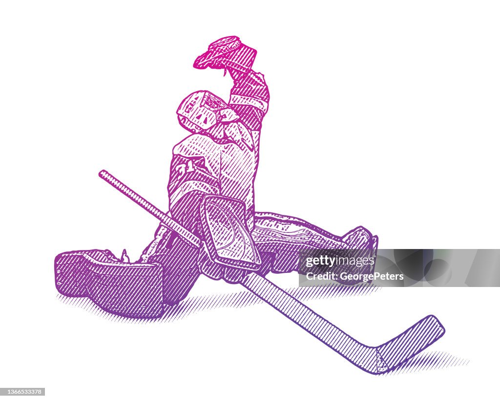 Ice Hockey goalie making a save