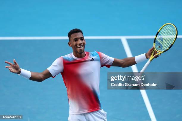 Felix Auger-Aliassime of Canada celebrates a match point win in his fourth round singles match against Marin Cilic of Croatia during day eight of the...